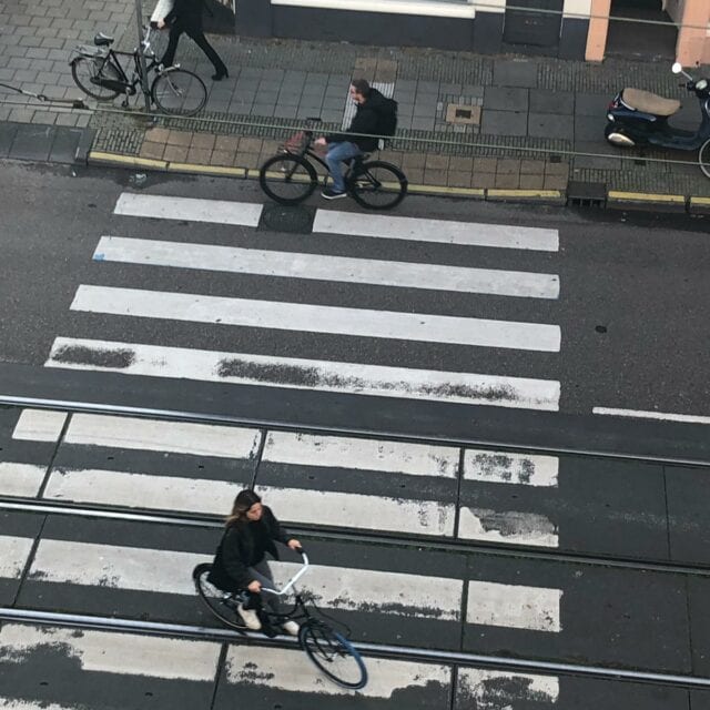 person biking on the street